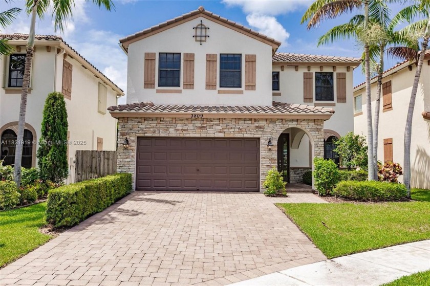 Beautiful 2-story home featuring a striking brick-accented front - Beach Home for sale in Boynton Beach, Florida on Beachhouse.com