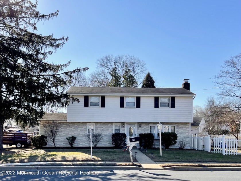 This modern and clean home in the heart of Oakhurst features 3 - Beach Home for sale in Oakhurst, New Jersey on Beachhouse.com