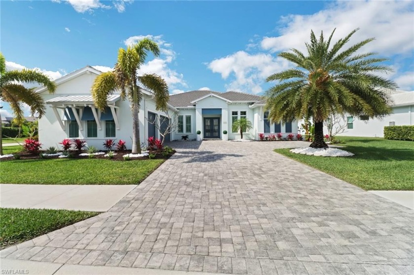 Welcome to this rarely available *Aragon* in Azure at Hacienda - Beach Home for sale in Naples, Florida on Beachhouse.com