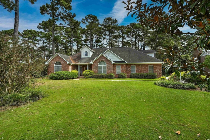 This immaculate 4-bedroom, 3-bath all-brick Executive residence - Beach Home for sale in Little River, South Carolina on Beachhouse.com