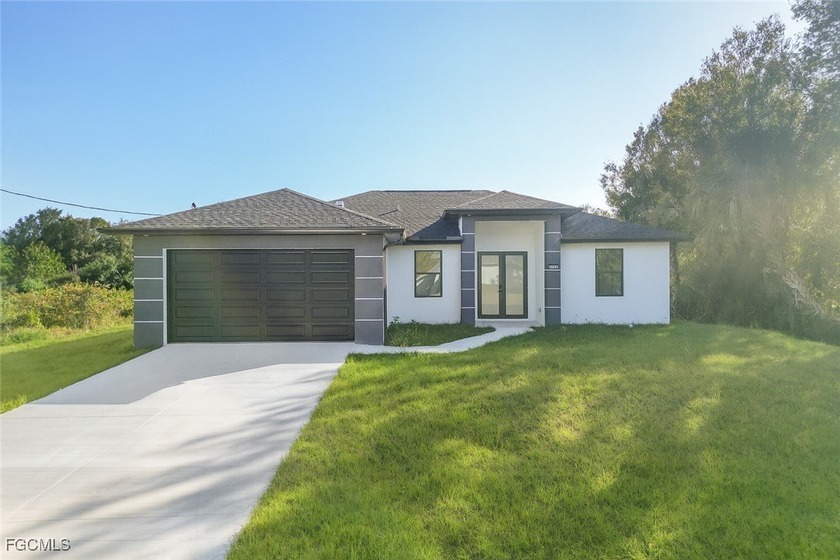 Experience modern style, privacy, and value in this stunning - Beach Home for sale in Lehigh Acres, Florida on Beachhouse.com