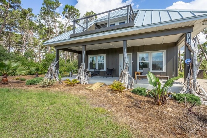 Stunning Bayfront Retreat on Florida's Forgotten Coast 1.5+ - Beach Home for sale in Eastpoint, Florida on Beachhouse.com