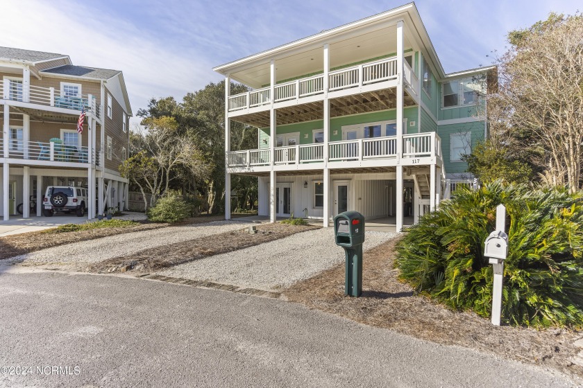 A hidden gem, this home features three spacious bedrooms, two - Beach Home for sale in Kure Beach, North Carolina on Beachhouse.com