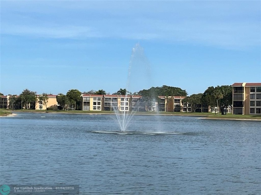 SPECTACULAR LAKE VIEW WITH LIGHTED 2 FOUNTAINS AT NIGHT. THIS 2 - Beach Condo for sale in Margate, Florida on Beachhouse.com
