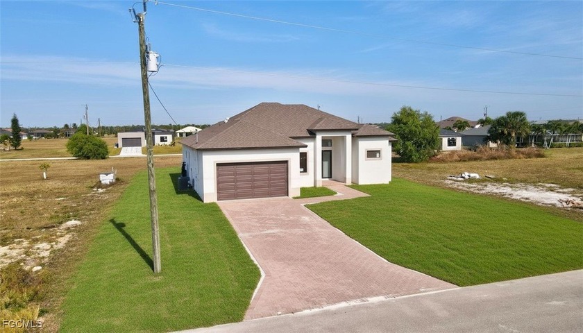 Welcome to this stunning new construction pool home offering - Beach Home for sale in Cape Coral, Florida on Beachhouse.com