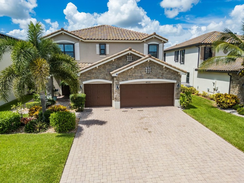 Direct LAKE VIEWS..Absolutely gorgeous home in PRESTIGIOUS gated - Beach Home for sale in Lake Worth, Florida on Beachhouse.com