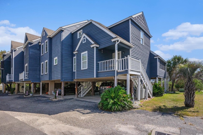 This raised beach townhome is an end unit featuring two spacious - Beach Condo for sale in North Myrtle Beach, South Carolina on Beachhouse.com