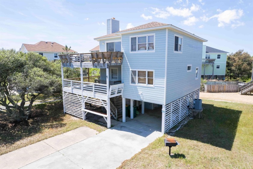 This inviting cottage is a must see!  It has a wonderfully - Beach Home for sale in Corolla, North Carolina on Beachhouse.com
