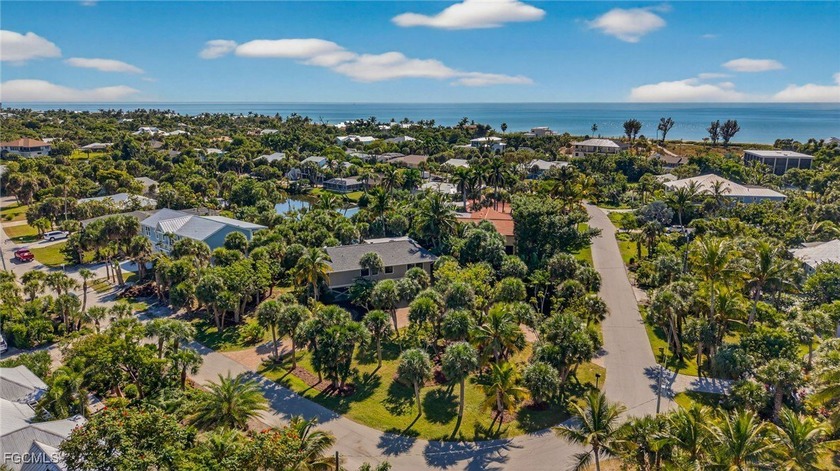 Tucked in a quaint, near-beach enclave, this serene lakefront - Beach Home for sale in Sanibel, Florida on Beachhouse.com