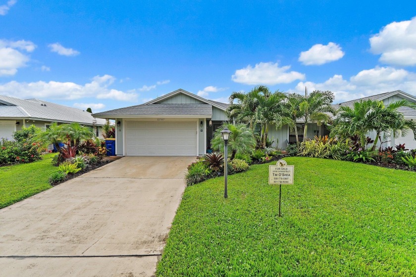 This charming home sits pretty on an oversized lot with stunning - Beach Home for sale in Hobe Sound, Florida on Beachhouse.com