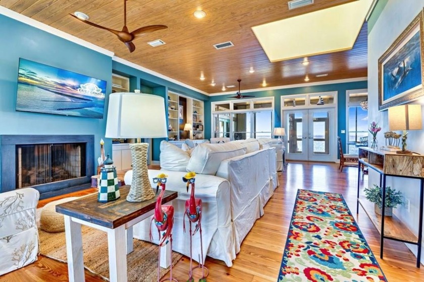 Custom Built, BAY FRONT home with private dock. NO MARSH to wade - Beach Home for sale in St. George Island, Florida on Beachhouse.com