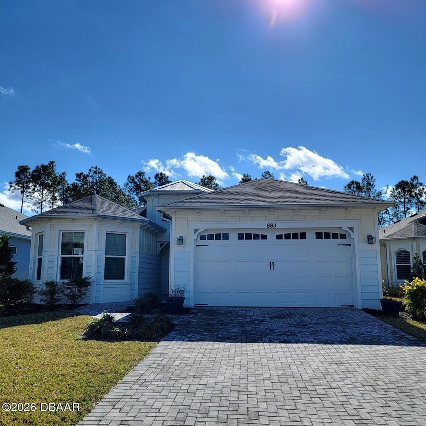 FANTASTIC OPPORTUNITY TO OWN IN THE HIGHLY DESIRED GATED - Beach Home for sale in Daytona Beach, Florida on Beachhouse.com