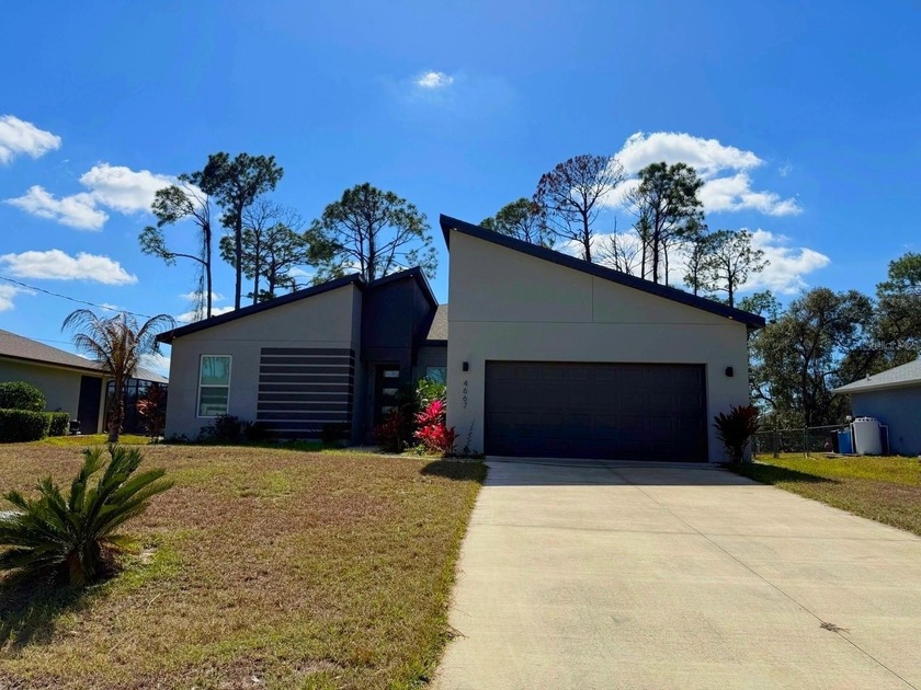 Built in 2023, this true 4-bedroom, 2-bath home with a two-car - Beach Home for sale in North Port, Florida on Beachhouse.com