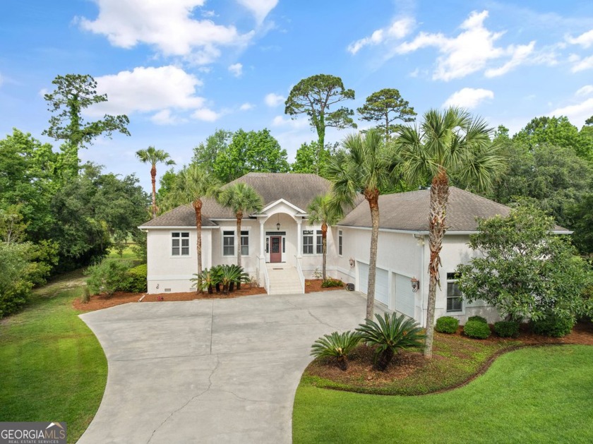 Nestled on a picturesque half-acre lot on the desirable Oak - Beach Home for sale in Brunswick, Georgia on Beachhouse.com