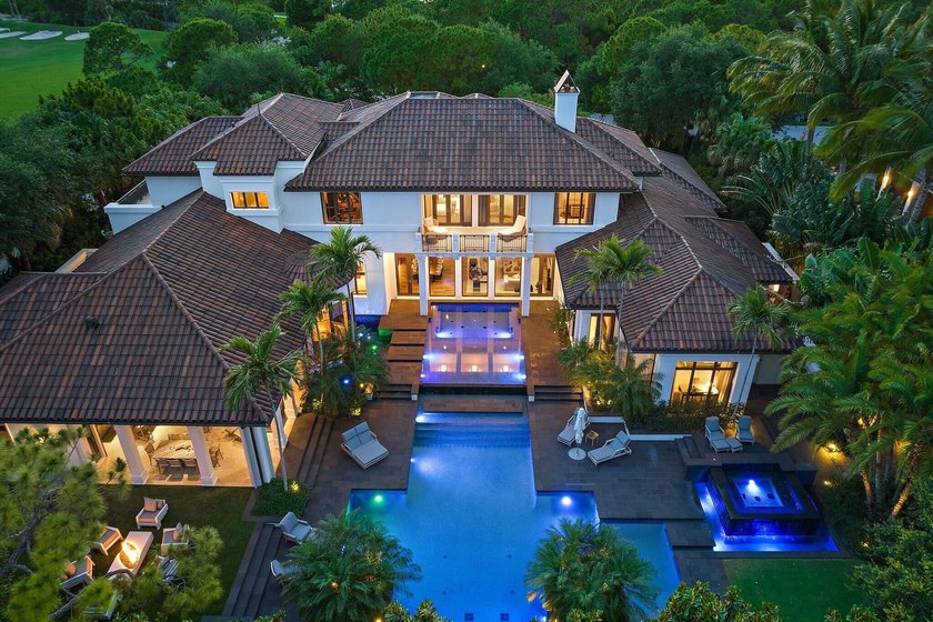 Located on nearly an acre along the second hole of the Nicklaus - Beach Home for sale in Jupiter, Florida on Beachhouse.com