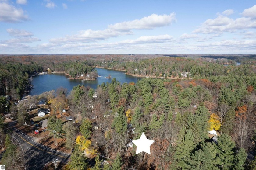 Nestled amidst serene beauty, this quintessential up-north - Beach Home for sale in Traverse City, Michigan on Beachhouse.com