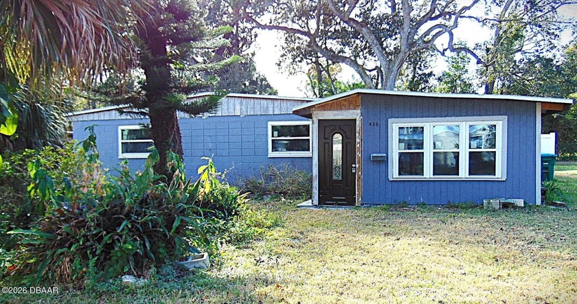 Calling all investors- This Gem got a NEW roof and all NEW white - Beach Home for sale in Holly Hill, Florida on Beachhouse.com