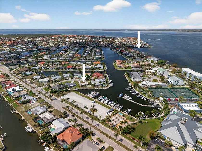 ONE OF THE MOST ICONIC LOCATIONS IN PGI! MERELY SECONDS FROM - Beach Home for sale in Punta Gorda, Florida on Beachhouse.com