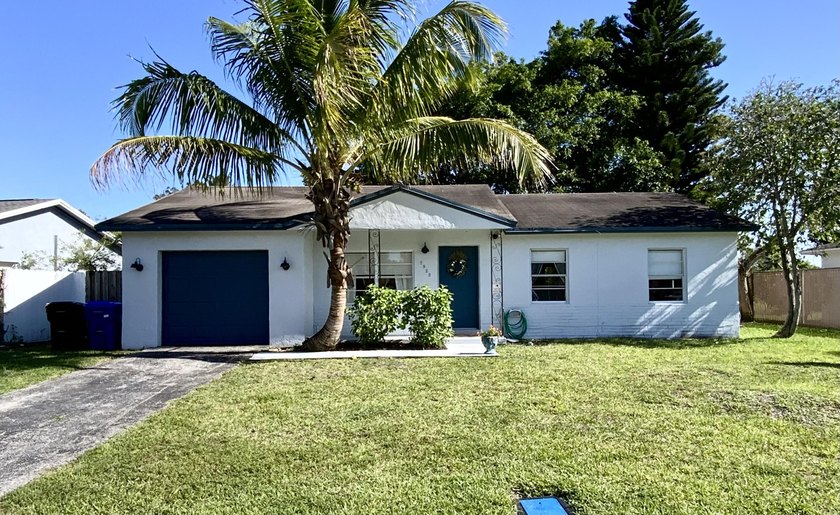 Stunning 3-bed, 2-bath pool home with a 1-car garage, ideally - Beach Home for sale in North Lauderdale, Florida on Beachhouse.com
