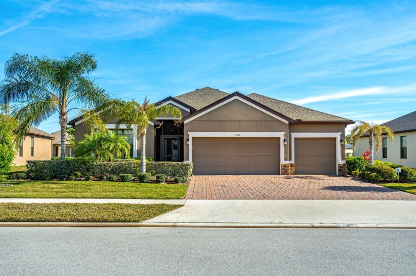 Discover a lakeside haven nestled on an expansive, premium lot - Beach Home for sale in West Melbourne, Florida on Beachhouse.com