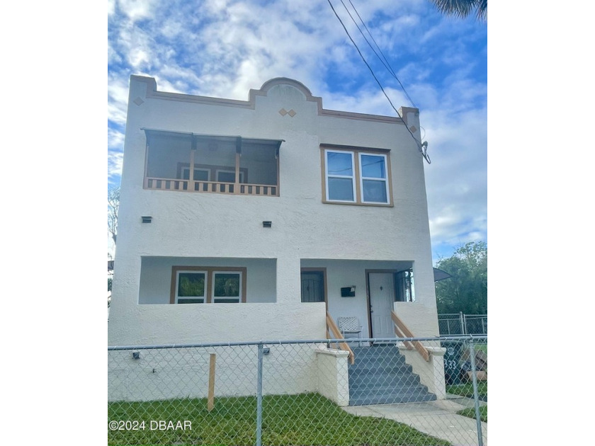 Nestled in the heart of Daytona Beach, this historic duplex, is - Beach Townhome/Townhouse for sale in Daytona Beach, Florida on Beachhouse.com