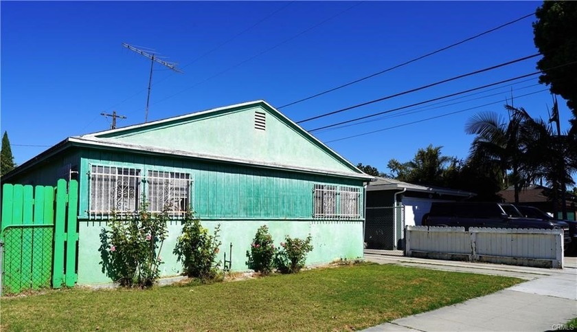 4 Bedrooms 2 baths fixer.  2 car detached garage, many fruit - Beach Home for sale in Long Beach, California on Beachhouse.com