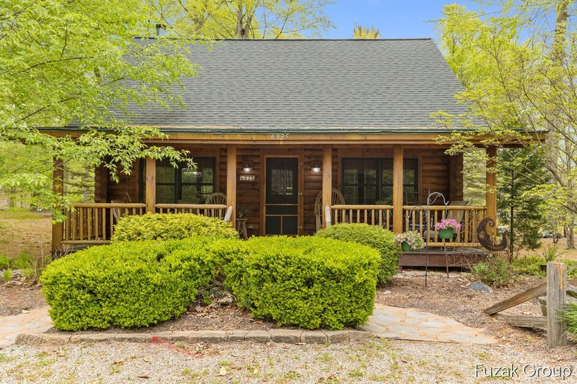 Enjoy lake life in this wonderful waterfront log home on - Beach Condo for sale in Saugatuck, Michigan on Beachhouse.com