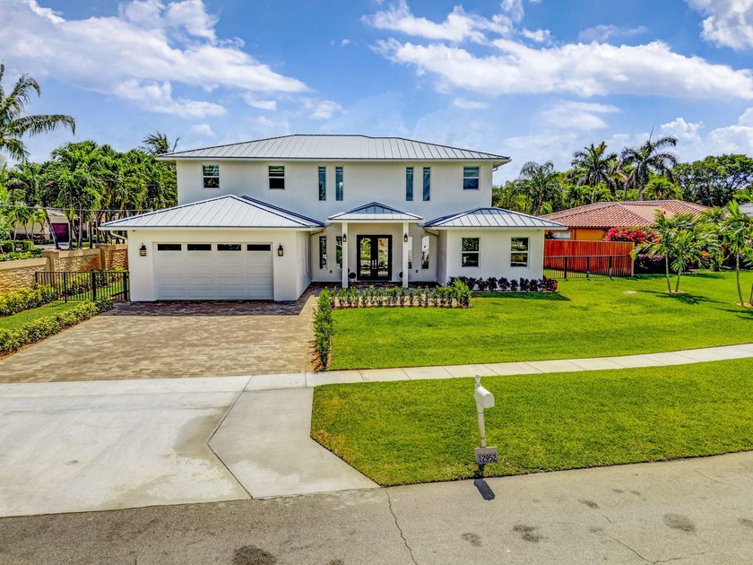 Welcome to this exceptional new construction residence in the - Beach Home for sale in North Palm Beach, Florida on Beachhouse.com