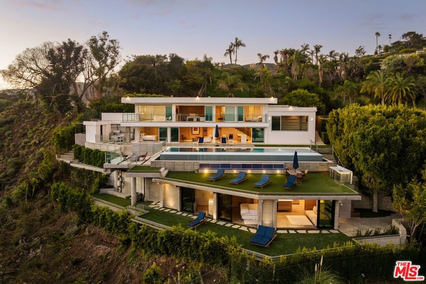 Perched high within the prestigious enclave of the Pacific - Beach Home for sale in Pacific Palisades, California on Beachhouse.com
