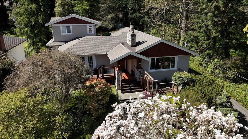 A wonderful home plus revenue! Offering ocean views and a - Beach Home for sale in Saanich, BC on Beachhouse.com