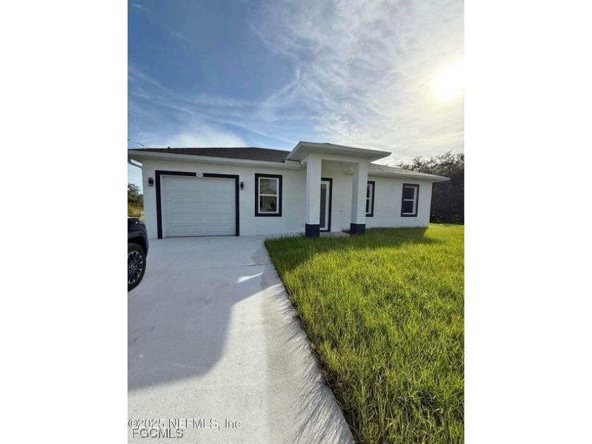 Welcome to your dream home at 1832 Lindsay Street! This - Beach Home for sale in Lehigh Acres, Florida on Beachhouse.com