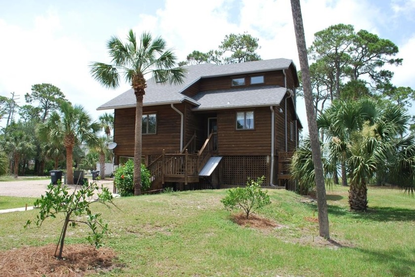 Great price for a bay front house in East Bay Estates on the - Beach Home for sale in St. George Island, Florida on Beachhouse.com