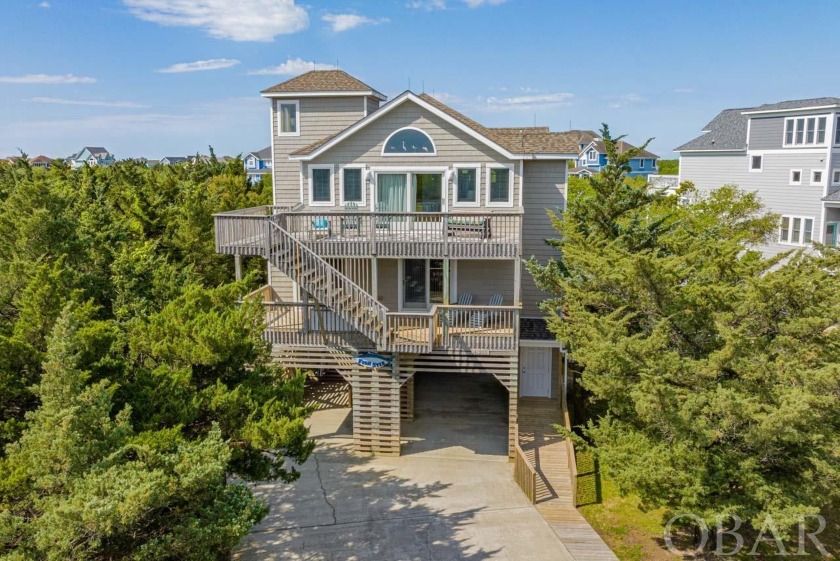 Welcome to your dream coastal retreat located in the heart of - Beach Home for sale in Avon, North Carolina on Beachhouse.com