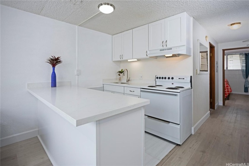 Turn Key!  New gourmet kitchen with quartz counters and solid - Beach Condo for sale in Honolulu, Hawaii on Beachhouse.com