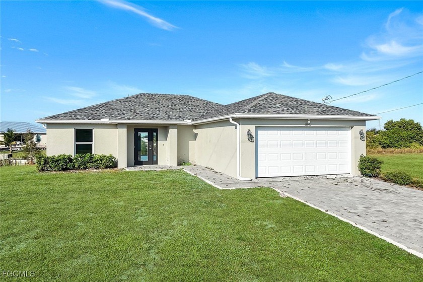 Discover modern Florida living in this 4-bedroom, 2-bathroom - Beach Home for sale in Cape Coral, Florida on Beachhouse.com