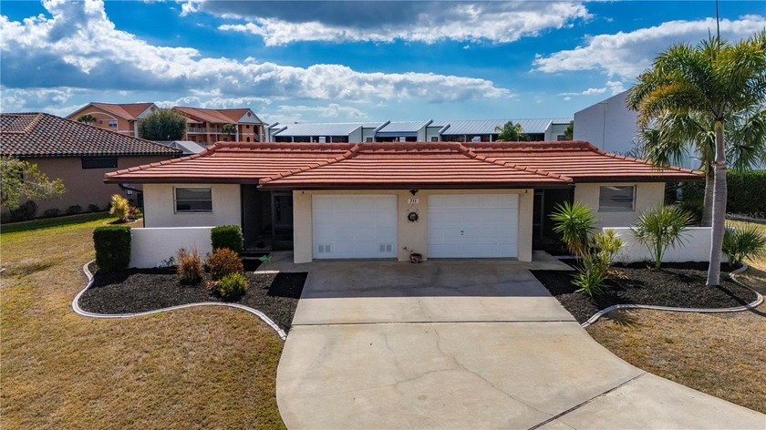 Income potential and waterfront living come together in a way - Beach Townhome/Townhouse for sale in Punta Gorda, Florida on Beachhouse.com