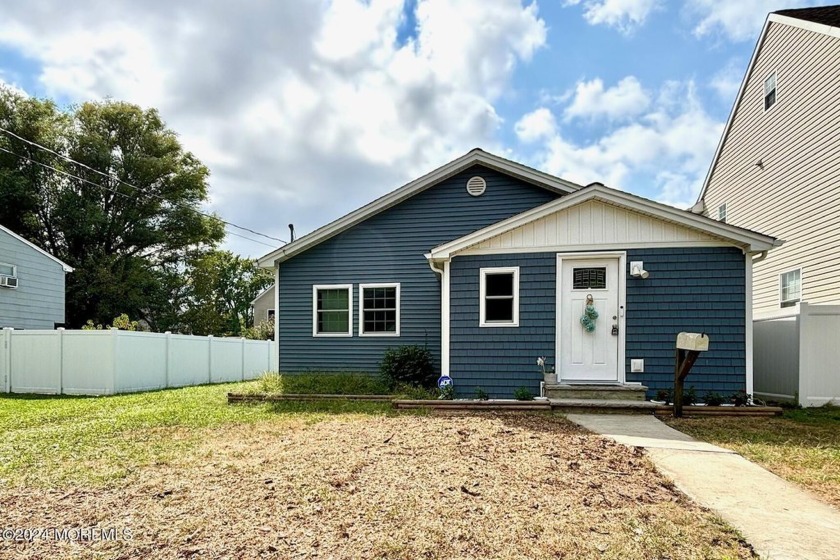 This bright and move-in ready home is now ready for its' new - Beach Home for sale in North Middletown, New Jersey on Beachhouse.com