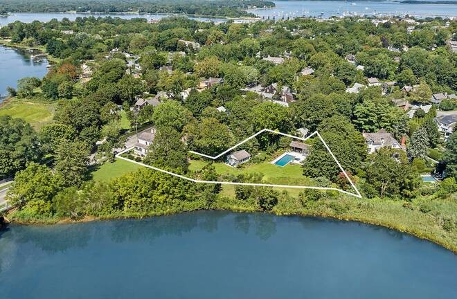 Overlooking Otter Pond in the heart of Sag Harbor Village, this - Beach Home for sale in Sag Harbor, New York on Beachhouse.com