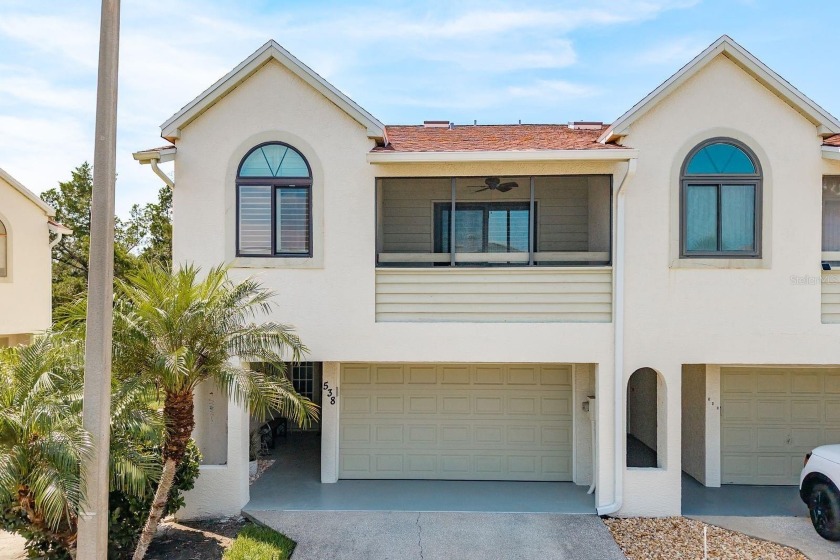 Discover the perfect blend of coastal charm and modern luxury in - Beach Townhome/Townhouse for sale in Dunedin, Florida on Beachhouse.com
