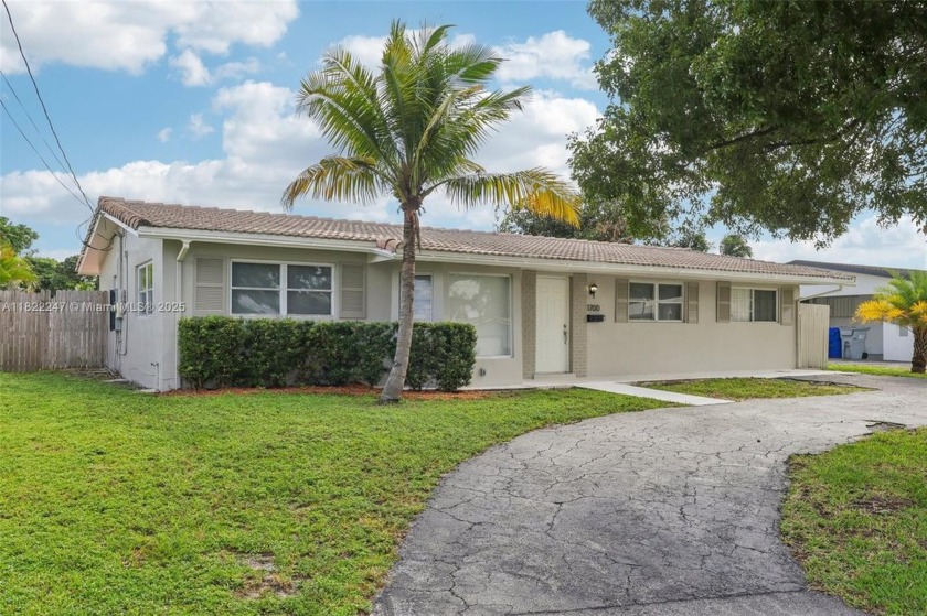 Welcome Home to this beautifully updated 4-bed, 3-bath residence - Beach Home for sale in Pompano Beach, Florida on Beachhouse.com