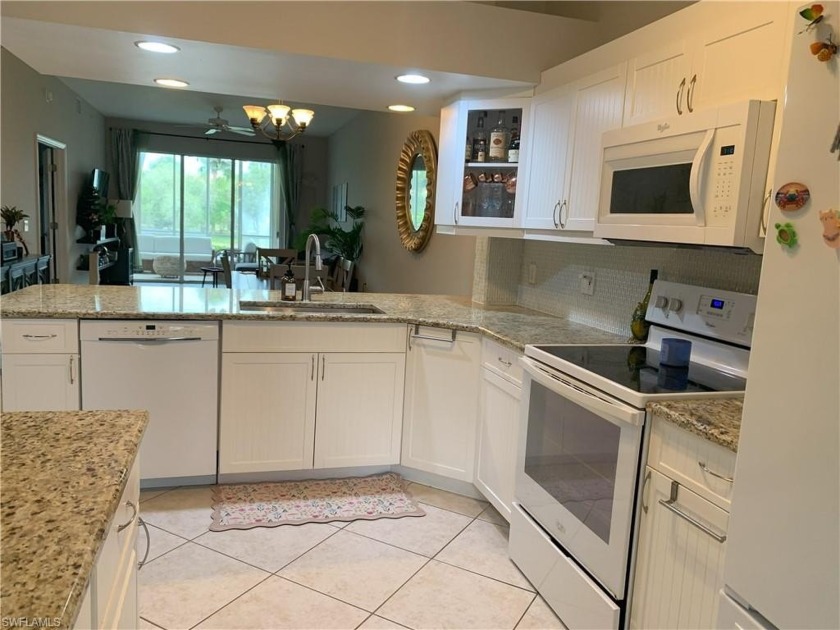 WALK RIGHT IN AND  BE GREETED BY THE WATER VIEW AND FOUNTAIN FOR - Beach Home for sale in Naples, Florida on Beachhouse.com