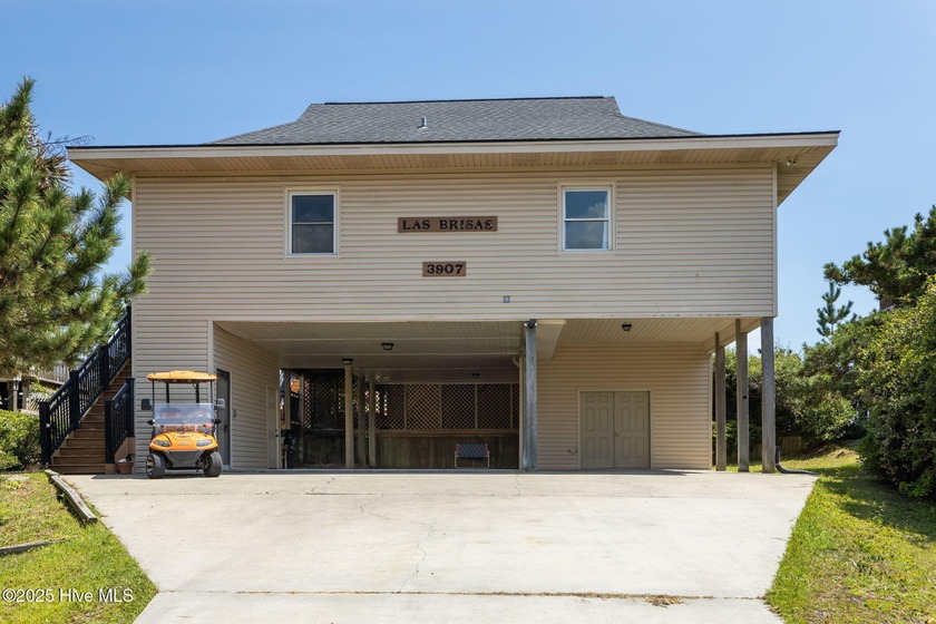 Nestled atop a high dune in one of the island's most coveted - Beach Home for sale in Emerald Isle, North Carolina on Beachhouse.com