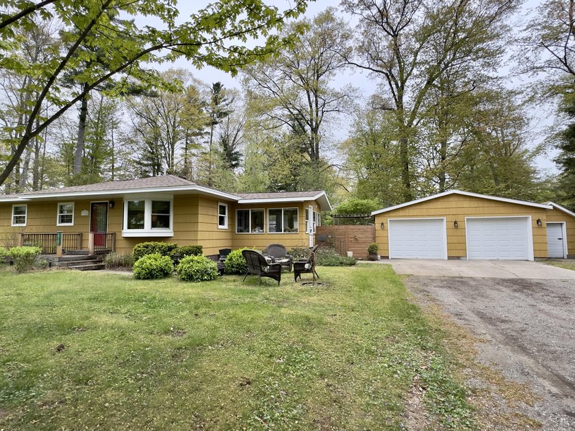 Location, updates, and space! Set on a quiet street in the - Beach Home for sale in Spring Lake, Michigan on Beachhouse.com