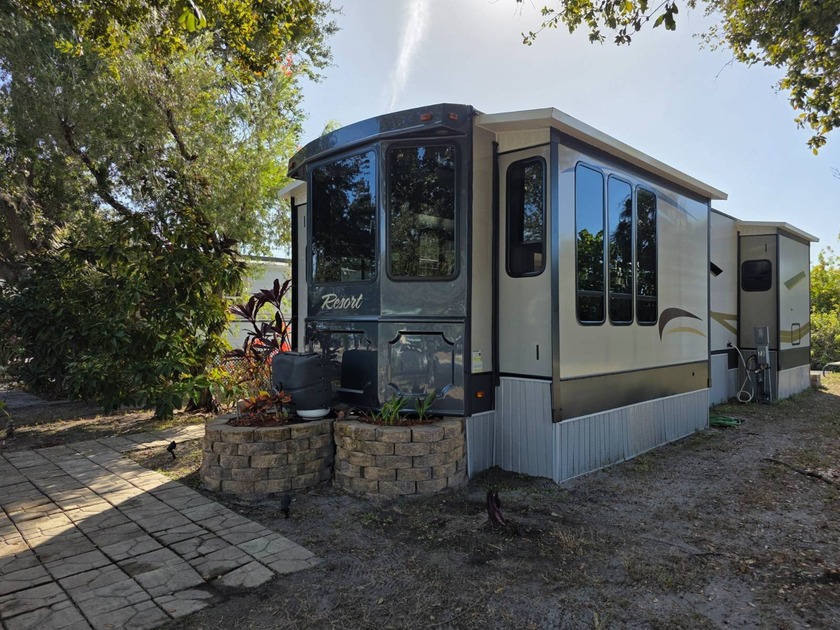 This Home Is Like Brand New ! Comes with Newer Golf Cart with - Beach Home for sale in Port Charlotte, Florida on Beachhouse.com