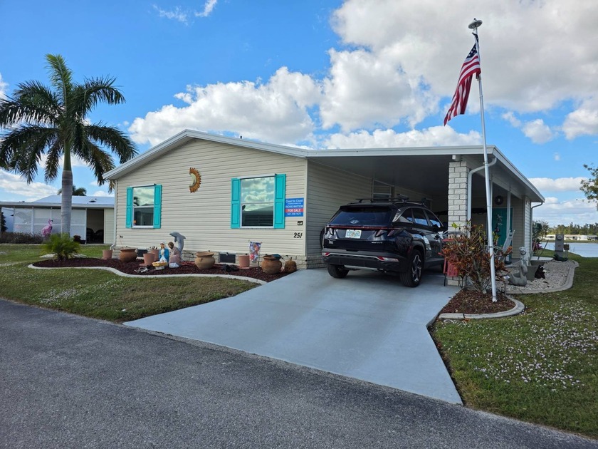 Lake View Home in Gated 55 Plus Community! This Home is Like - Beach Home for sale in Punta Gorda, Florida on Beachhouse.com