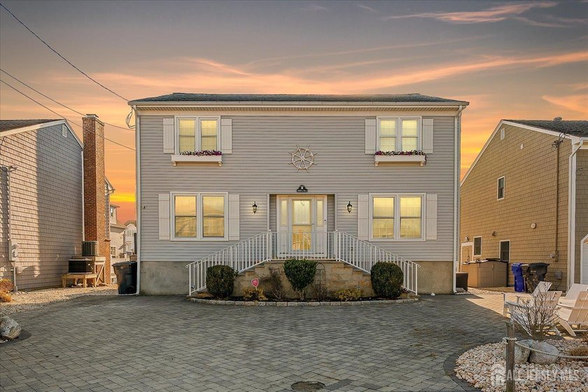 Nestled in coveted Mantoloking, this 5bed, 2.5bath lagoon front - Beach Home for sale in Mantoloking, New Jersey on Beachhouse.com