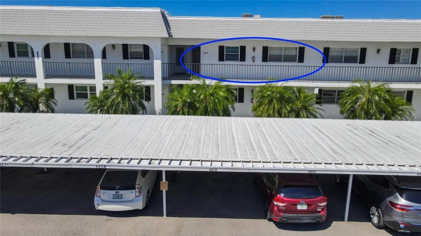 You'll enjoy the view of Sarasota Bay and the tranquil pond from - Beach Condo for sale in Bradenton, Florida on Beachhouse.com