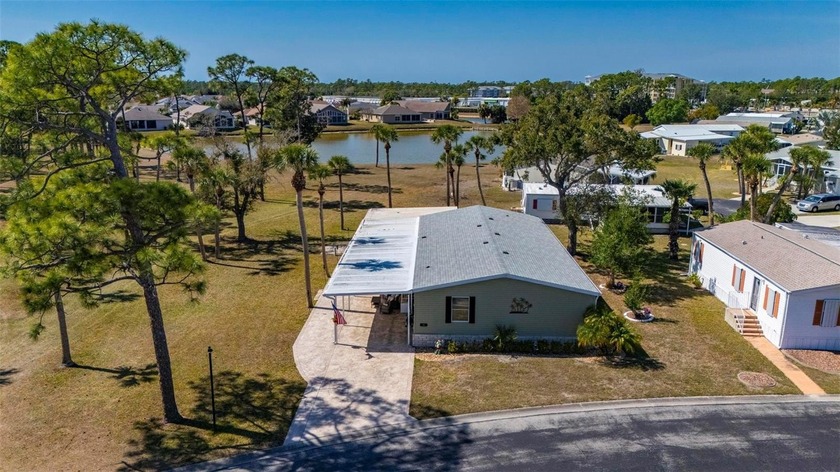 Discover an exceptional opportunity to own a spacious, furnished - Beach Home for sale in Port Charlotte, Florida on Beachhouse.com