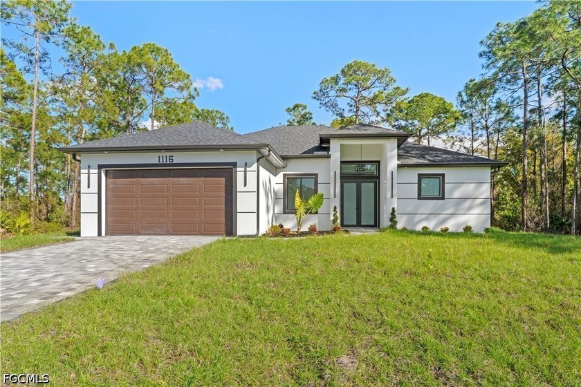 New construction! Beautiful 3-bedroom + den, 2-bath home on a - Beach Home for sale in Lehigh Acres, Florida on Beachhouse.com