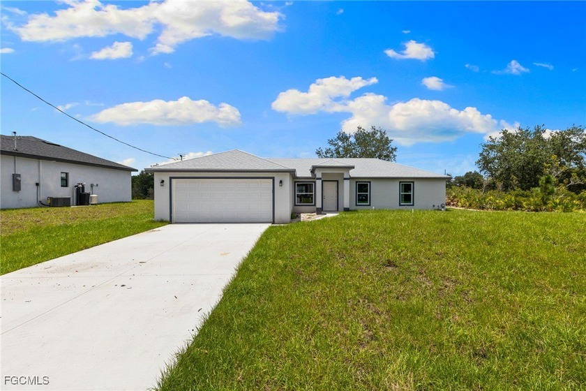 Seller will pay towards closing costs! NEW CONSTRUCTION WITH - Beach Home for sale in Lehigh Acres, Florida on Beachhouse.com